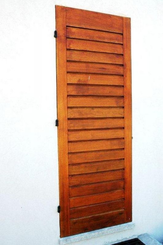 Volets persiennés essence Iroko